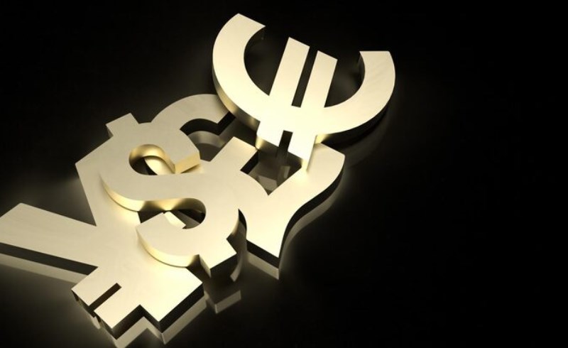 외환시장 거래시간대별 특징과 수익 기회를 극대화하는 세션별 변동성 활용 전략 27 어두운 배경에서 밝게 빛나고 있는 달러, 유로, 엔화 등 주요 통화 기호들