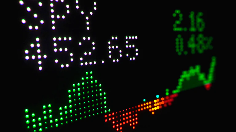 2026년 FOMC 점도표 해석, 연준 위원들이 생각하는 적정 금리와 주가 전망 핵심 분석 27 주식 시장 차트를 분석하는 투자자